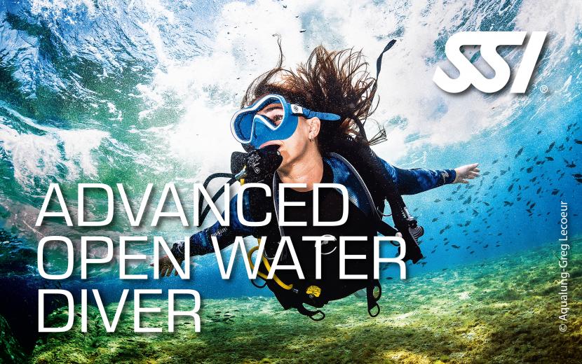 advanced open water diver marvelling at the underwater world