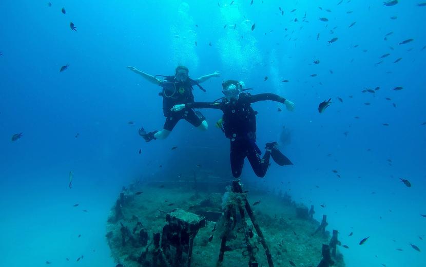 teens under water on the shipwreck