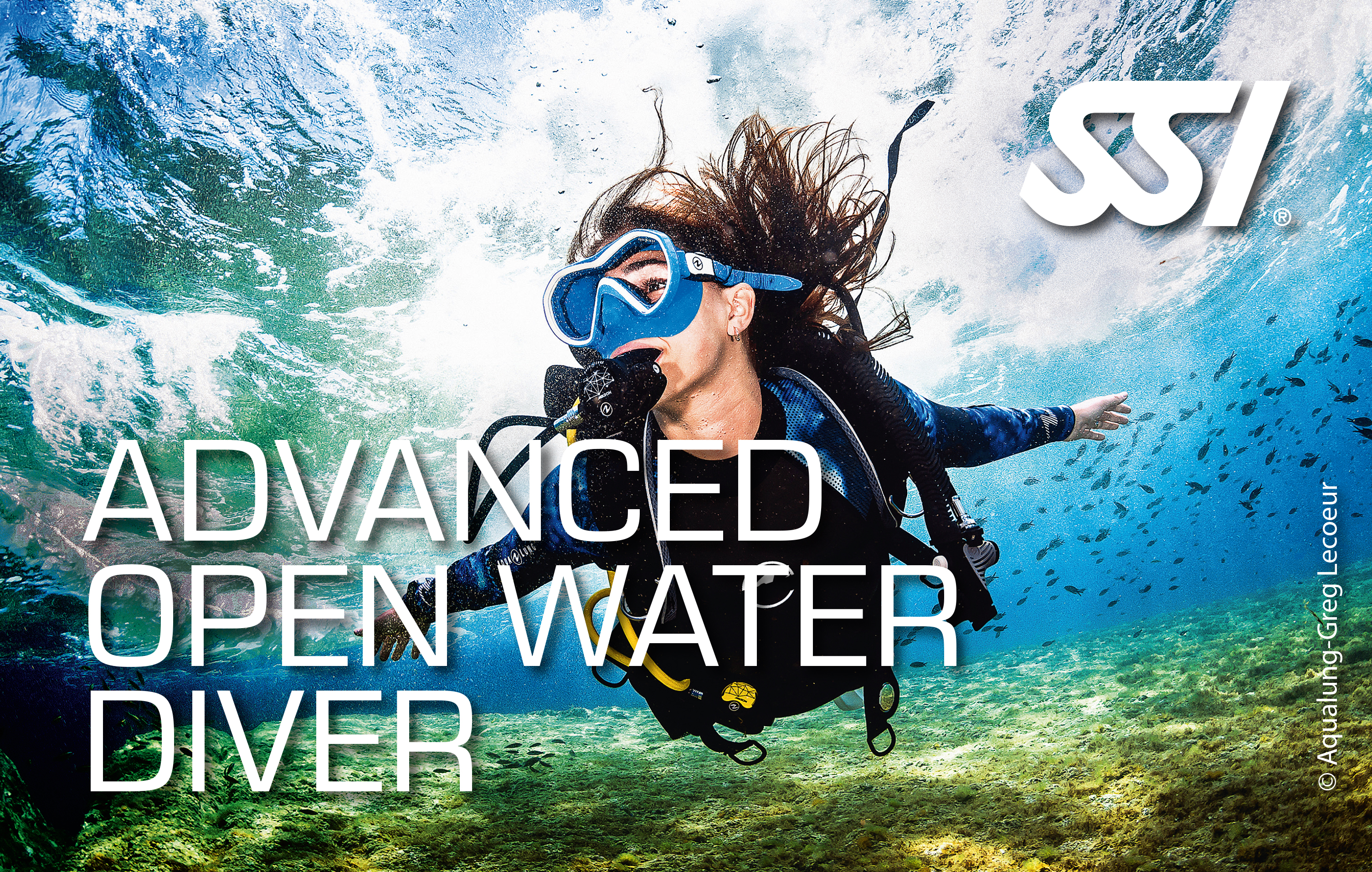 advanced open water diver marvelling at the underwater world